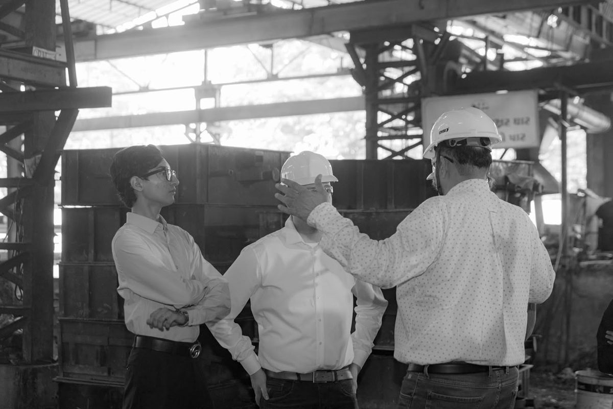 Swayam J. Shah reviewing castings operations on the Fine Cast foundry floor in Anand with the team