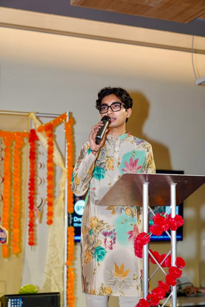 Swayam J. Shah addressing students at a University of Greenwich cultural celebration
